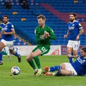 Preston North End midfielder Paul Gallagher is fouled by Cardiff's Aden Flint