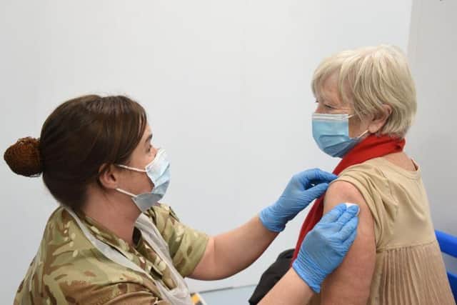 Over half a million people have been given their first dose of the vaccine in Lancashire