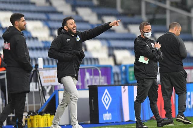 Huddersfield head coach Carlos Corberan on the touchline during his side's defeat to Preston North End in October