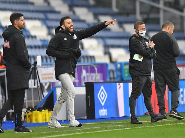 Huddersfield head coach Carlos Corberan on the touchline during his side's defeat to Preston North End in October