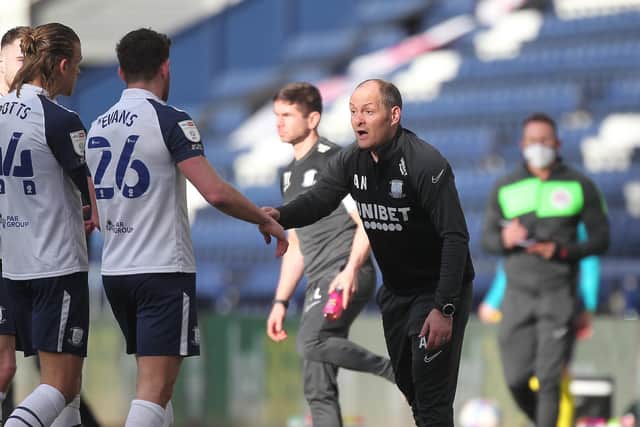 Preston North End manager Alex Neil dishes out instructions to Brad Potts and Ched Evans during the win against Huddersfield