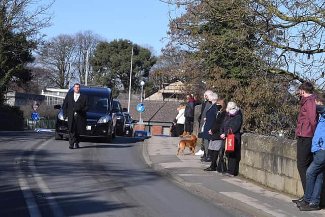 Friends and acquaintances pay their respects during Margaret Walmsley's final journey through Garstang.
