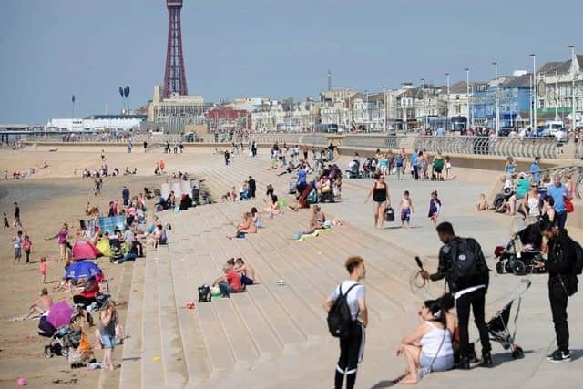 A number of people from Birmingham and Bradford were fined for "enjoying walks on Blackpool Promenade", said Lancashire Police