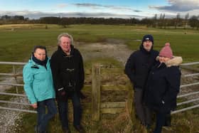 Councillors Gordon and Margaret France and residents Lisa and Richard Curzon at the site of the proposed sand excavation site