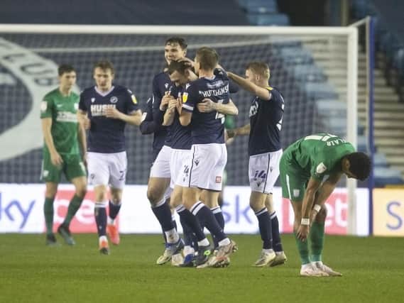 Millwall congratulate Scott Malone after he equalised.