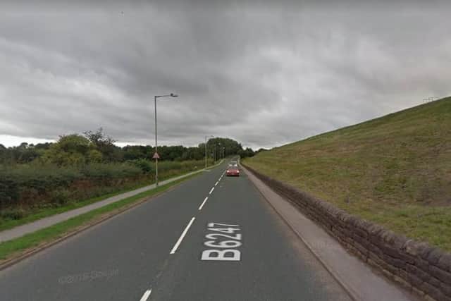 The boy was struck from behind by an unknown vehicle as he was walking along Colne Road. (Credit: Google)