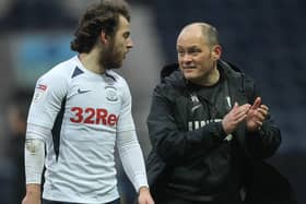 Former PNE midfielder Ben Pearson chatting with Alex Neil