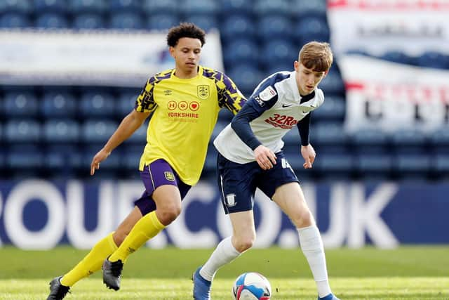 Anthony Gordon in action against Huddersfield Town