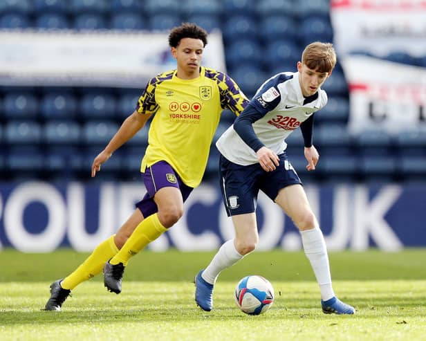 Anthony Gordon in action against Huddersfield Town