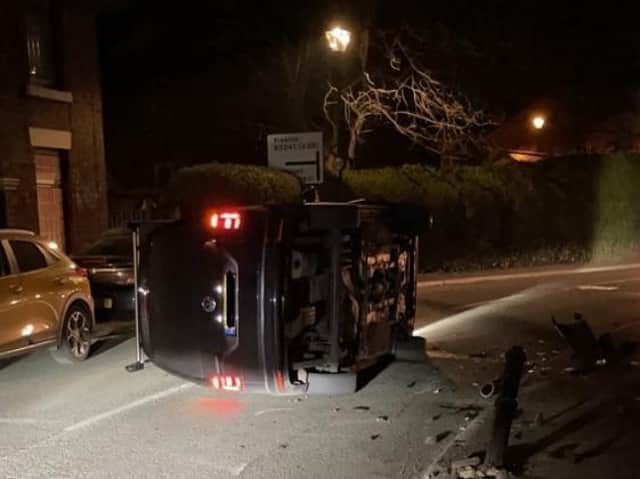 The car on its side in Town Road, Croston (Image: Lancs Road Police).
