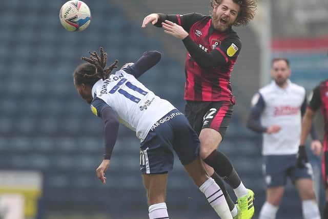 Preston North End midfielder Daniel Johnson battles with his former team-mate Ben Pearson in the 1-1 draw with AFC Bournemouth