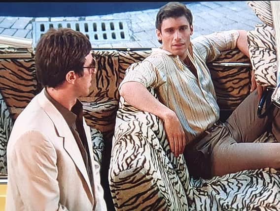 Manny (right) and Tony in Scarface.
