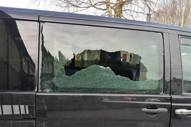 On February 22, a stone smashed through the back window of an Ashton Allied people carrier in Miller Lane, Ribbleton whilst passengers were inside. Pic credit: Ashton Allied Taxis