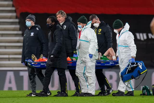 Patrick Bauer is stretchered off the pitch during PNE's win against Bournemouth at the Vitality Stadium in December