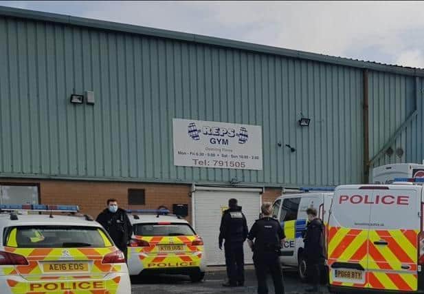 Police at Reps Gym in Roman Way Industrial Estate yesterday (March 11)