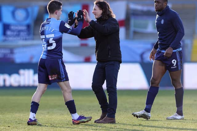 Wycombe manager Gareth Ainsworth congratulates Anis Mehmeti after the win against PNE