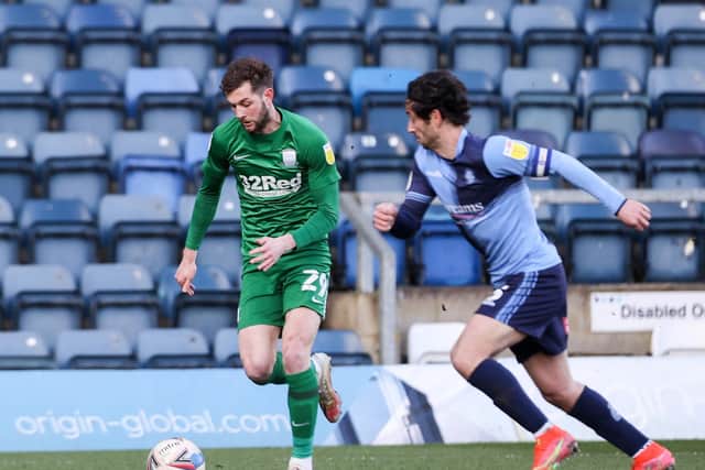 PNE substitute Tom Barkhuizen gets away from Wycombe left-back Joe Jacobson