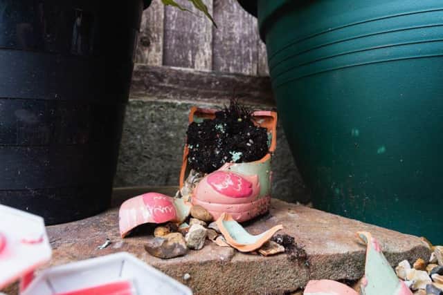 The mum-of-four claims that the workmen ruined her garden memorial for her late son