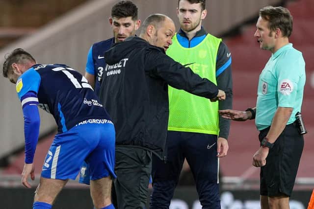 PNE manager Alex Neil makes his point about Alan Browne's red card to referee Oliver Langford
