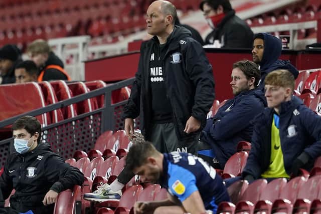 Alex Neil watches from the stand after being sent-off during PNE's defeat at Middlesbrough