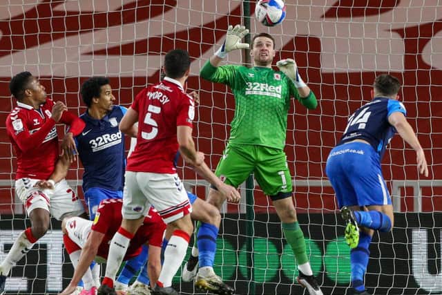 North End defender Jordan Storey sees a header pushed over the bar by Middlesbrough goalkeeper Marcus Bettinelli