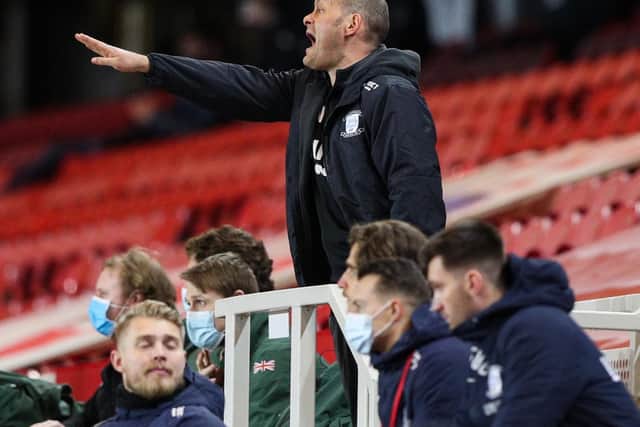 Alex Neil shouts instructions from the stand after being red-carded in PNE's defeat at Middlesbrough