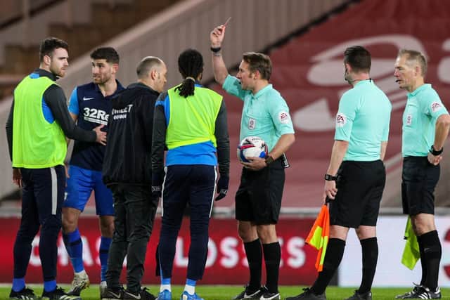 PNE boss Alex Neil is shown the red card by referee Oliver Langford