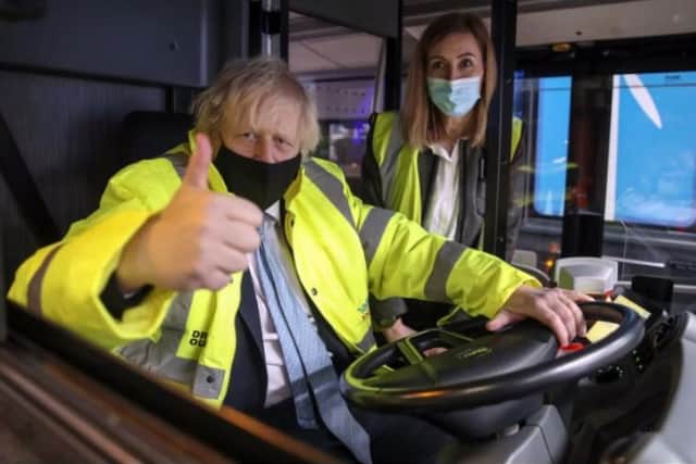 Boris Johnson at the wheel of a new electric bus.