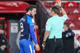 Preston North End skipper Alan Browne is shown the red card by referee Oliver Langford at Middlesbrough