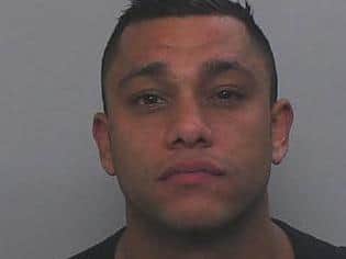 Adam Bhamji (pictured) is described a 5ft 9in tall, of large, muscular build, with short black hair, brown eyes and tribal tattoos.