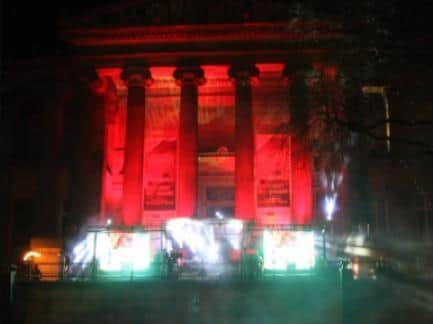 The Harris Library and Museum lit up red in 2016.