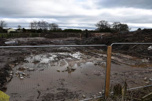 The developer of the estate at the junction of Cumeragh Lane and Camforth Hall Lane said they had been intended to pump water across the site - not off it (image: Neil Cross)