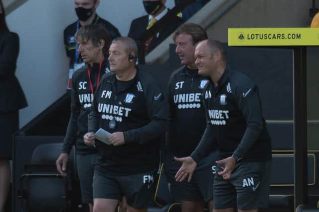 Frankie McAvoy with Steve Thompson and Alex Neil in the technical area during Preston North End's game at Norwich in September 2020