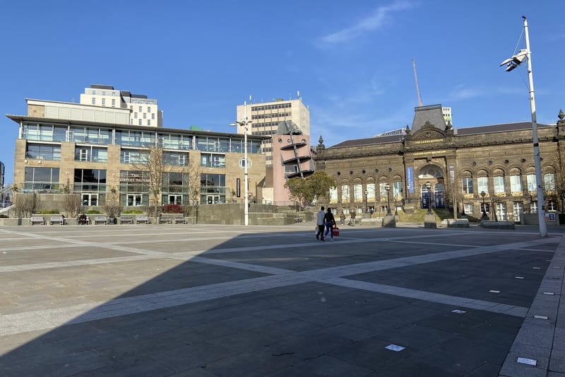 An almost-empty Millennium Square on the first day of lockdown