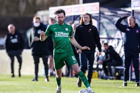 Preston North End skipper Alan Browne in action against Wycombe