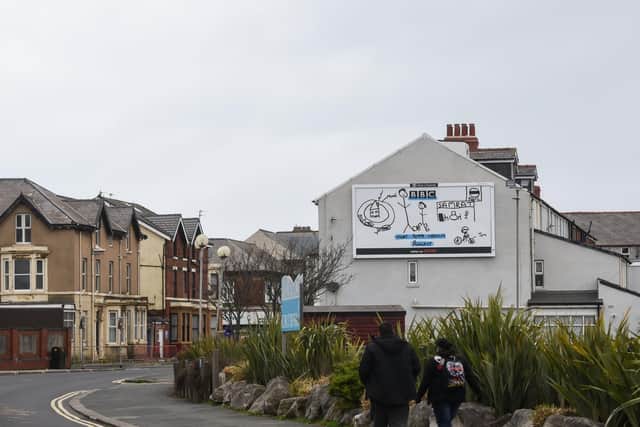 Football legend Peter Crouch has designed his first billboard which has appeared in Blackpool