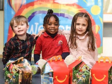 Children from The Rainbow Nursery, Preston were given free McDonald's Happy Meals for lunch. Pictured is Harry Jackson, Nijikeng Achaleke and Raeesa Beg, all aged 4. Photo: Daniel Martino.