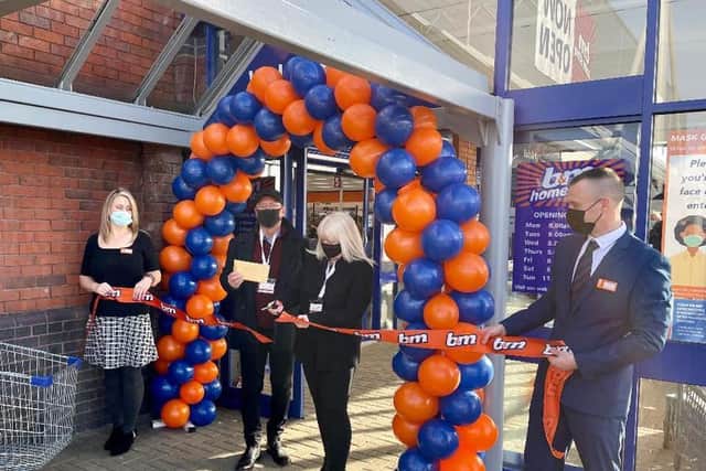 Jack and Sue McVicar (centre), who founded local charity Luv Preston, were invited to officially open the new B&M store in Mariner's Way this morning (Saturday, March 27). Pic: Luv Preston