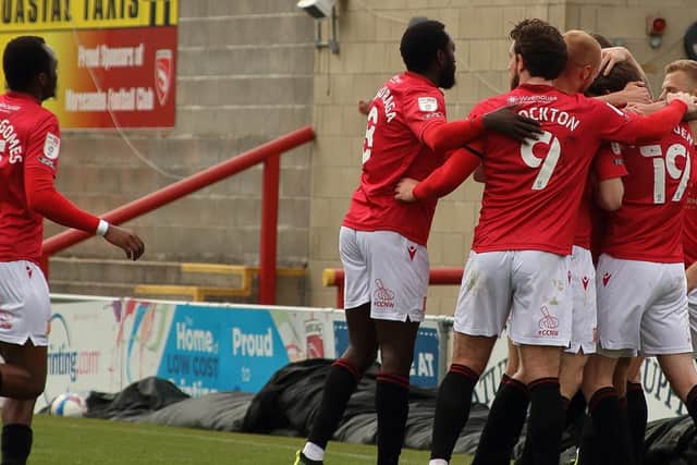 Morecambe celebrate Liam McAlinden's winning goal against Cheltenham Town last weekend