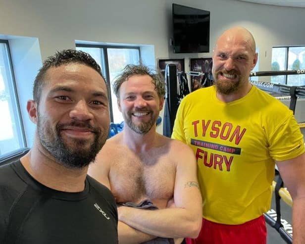 Joseph Parker, left, with Andy Lee, middle, and Tyson Fury