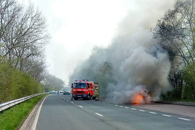 The car burst into flames in Preston New Road, Freckleton this afternoon (March 31). Pic credit: Gary Thomas