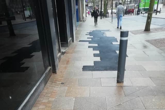 An example of the 'temporary' fix using asphalt in the city centre