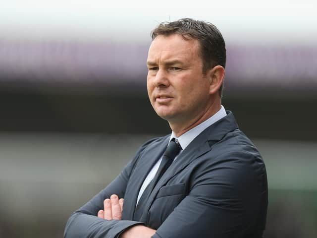 Morecambe boss Derek Adams saw his men lose at Cambridge United