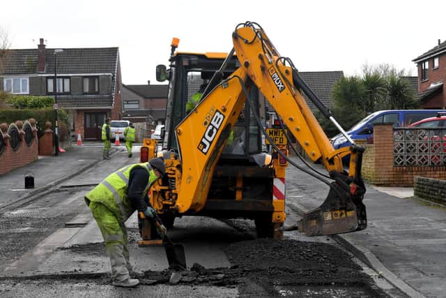 Preparations for surface dressing work to create a smoother, more weather-resistant surface (image: Neil Cross)