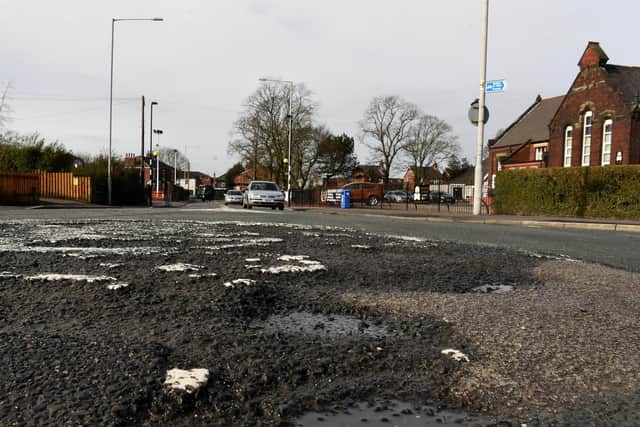 Lancashire county councillors have clashed over repairs to individual potholes (image: Neil Cross)