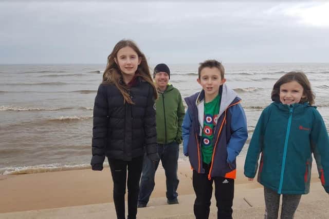 The late Lauren Menzies (left) with dad Chris, brother Rafe and sister Leah