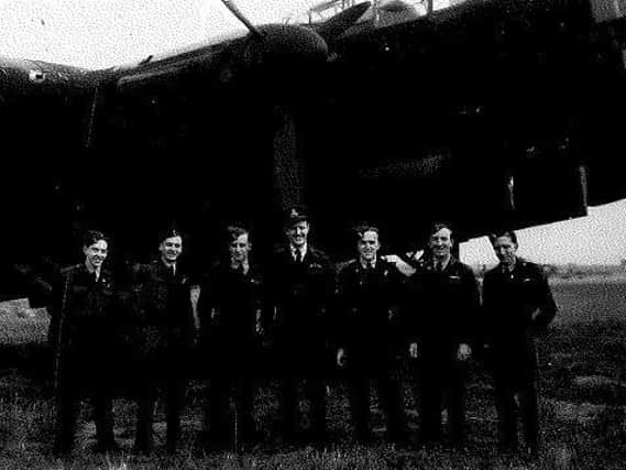 John Valentine (far left) with are crew between sorties.