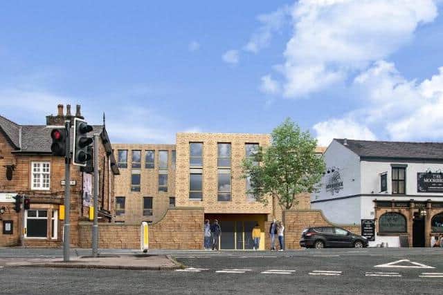 How the apartments will look, sitting in between the disused Unicorn pub and the still-trading Moorbrook Inn (image courtesy of David Cox Architects)