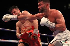 Scott Fitzgerald lands a right-hander against Anthony Fowler in the first meeting between the pair