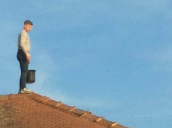 Ben Smith was caught on camera on the OAP's roof